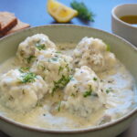 Greek giouvarlakia meatball soup in creamy egg-lemon avgolemono broth