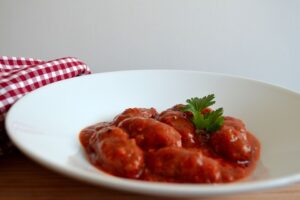 Soutzoukakia Smyrneika (Greek Meatballs in Tomato Sauce)